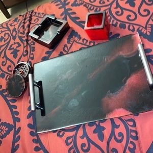 Eat tray or rolling tray with handles . ash tray and grinder